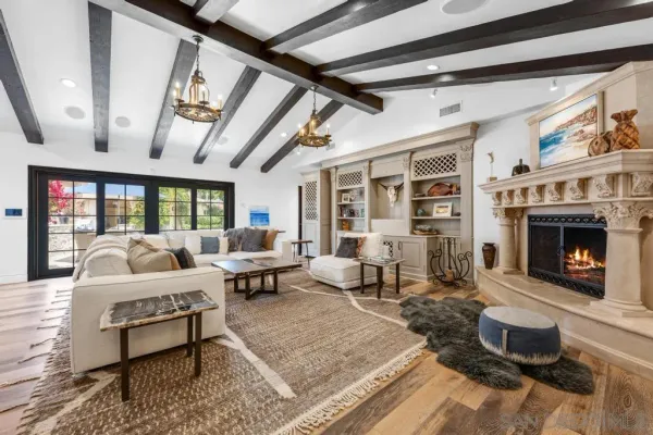 a kitchen that has a stove and a table