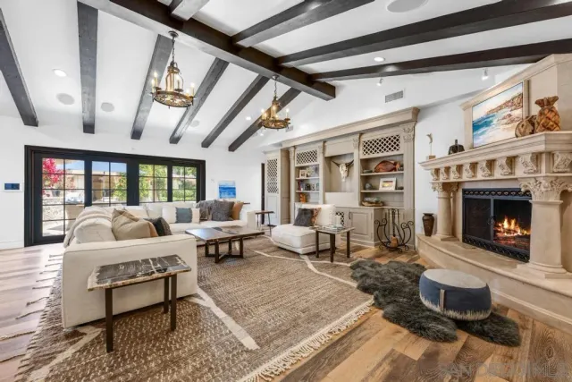 a kitchen that has a stove and a table