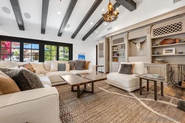 a kitchen with a sink a counter and cabinets