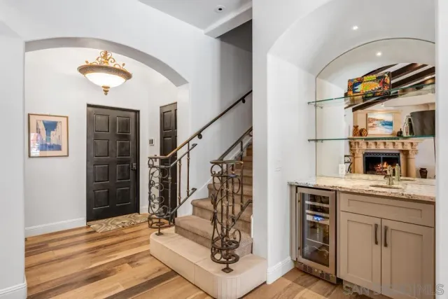 a kitchen with granite countertop a stove oven and sink