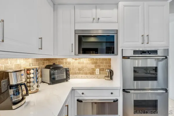 a view of entryway with a front door