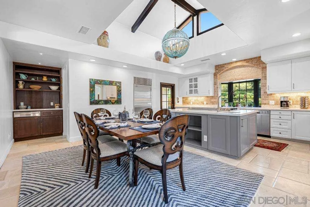 2643 Hidden Valley Road La Jolla, CA 92037 - Photo 33 of 61 a view of a dining room with furniture and window