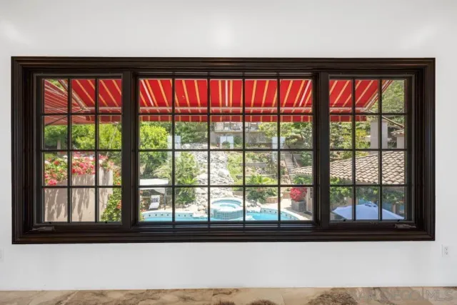 a bedroom with furniture and a fireplace