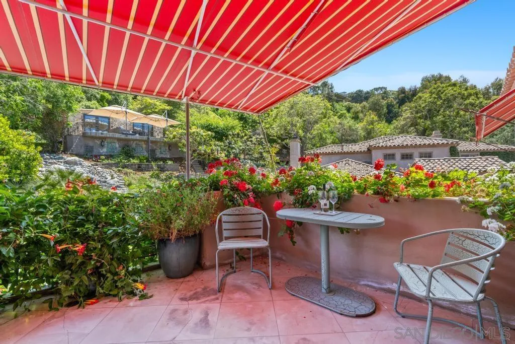 2643 Hidden Valley Road La Jolla, CA 92037 - Photo 43 of 61 a patio with an outdoor seating