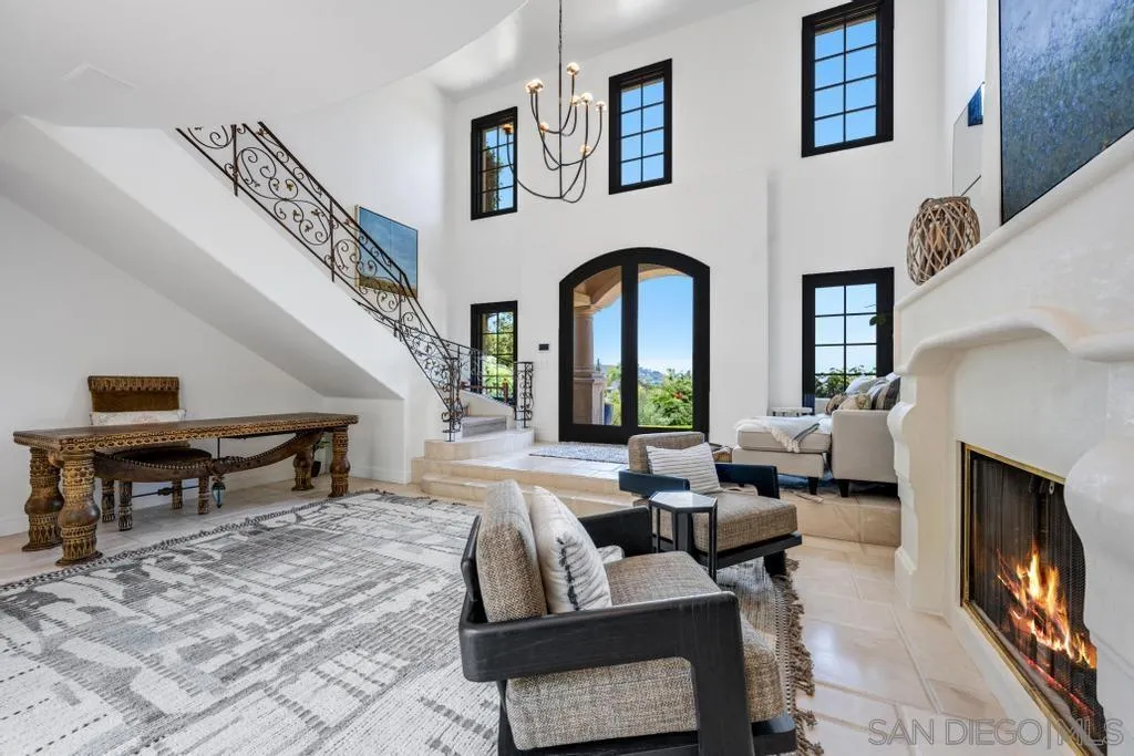 2643 Hidden Valley Road La Jolla, CA 92037 - Photo 8 of 61 a living room with furniture and a fireplace