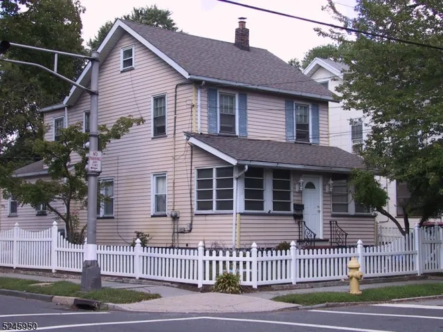 a front view of a house with a porch