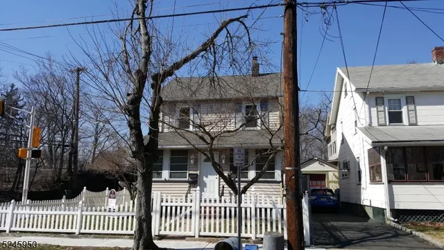 a house with white door and outdoor space