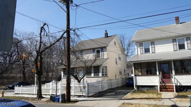 a view of a building with white walls