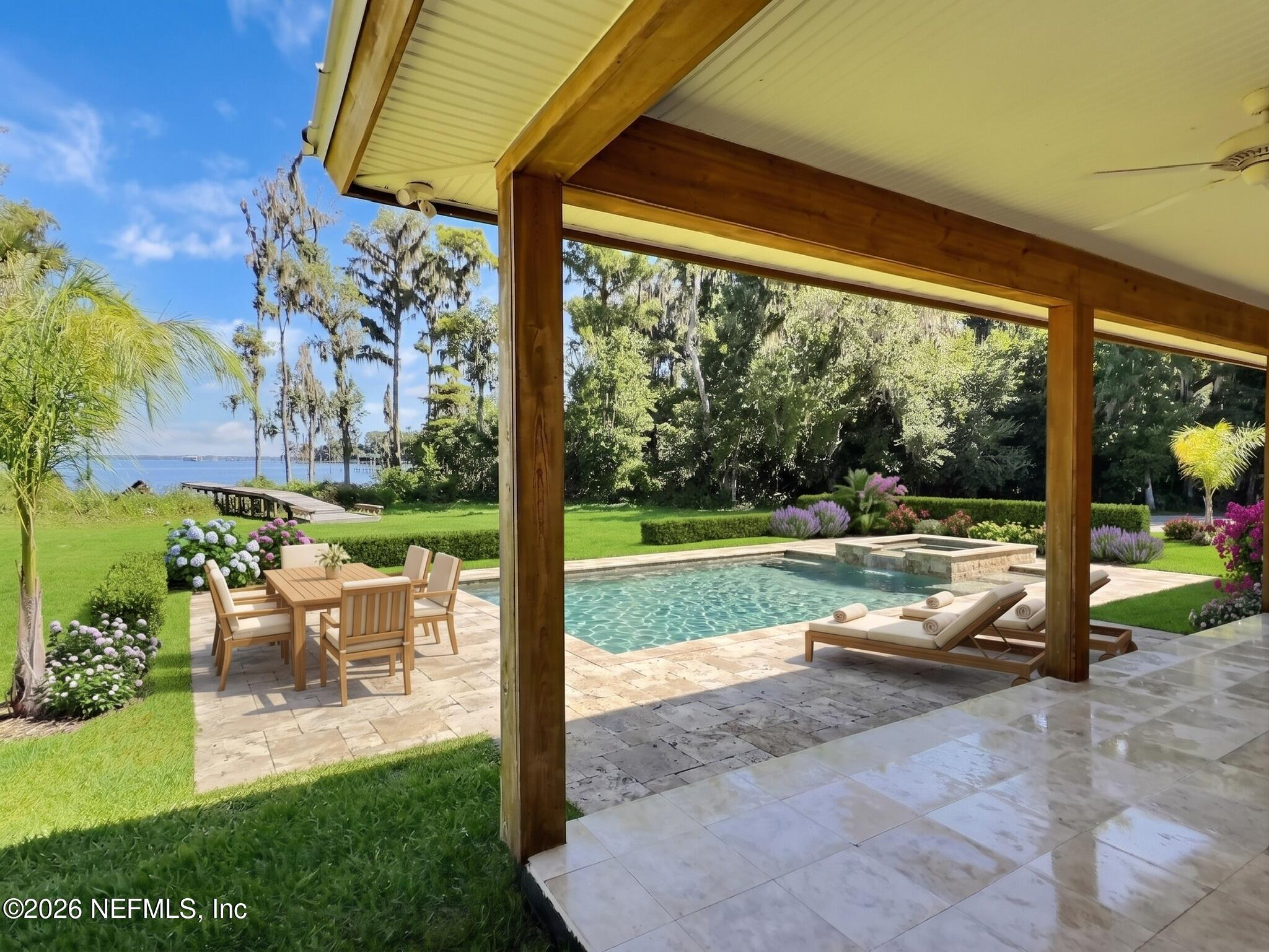 159 Mays Cove Road East Palatka, FL 32131 - Photo 30 of 62 a view of a swimming pool with a patio