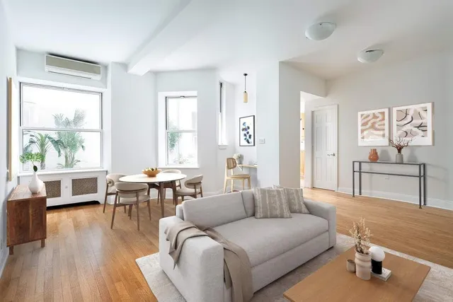 a picture of a book and a white wall