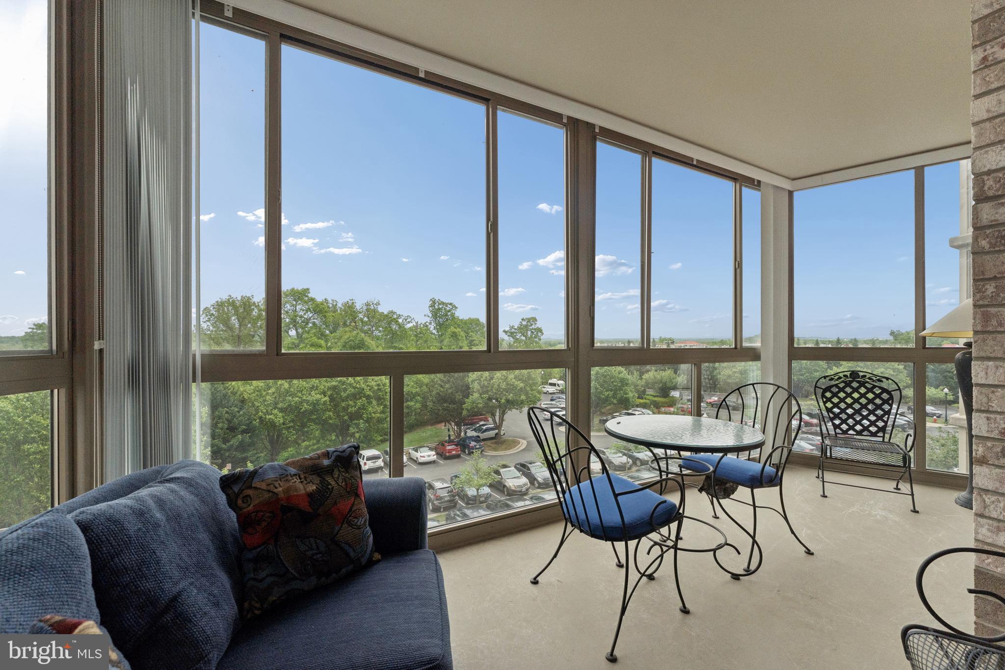 19355 Cypress Ridge Terrace, Unit 314 Leesburg, VA 20176 - Photo 26 of 49 Glass enclosed balcony