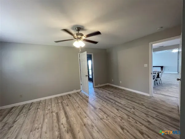 a bathroom with a mirror and sink