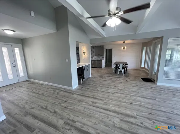 a bathroom with a double vanity sink and mirror