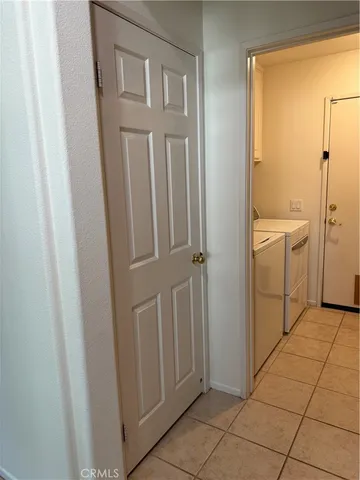 a view of a utility room with washer and dryer
