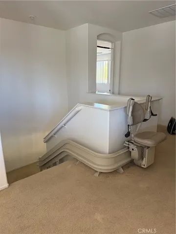 an empty room with wooden floor