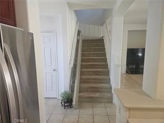 a view of entryway with white walls and windows