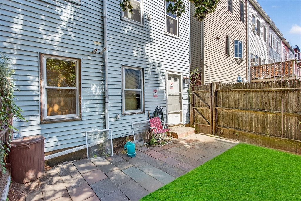 14 Wall Street Boston, MA 02129 - Photo 16 of 18 a backyard of a house with seating space