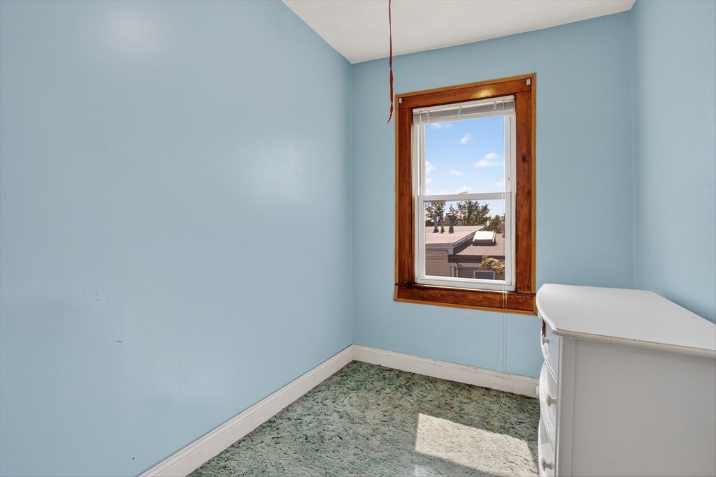 14 Wall Street Boston, MA 02129 - Photo 7 of 18 a view of an empty room with window