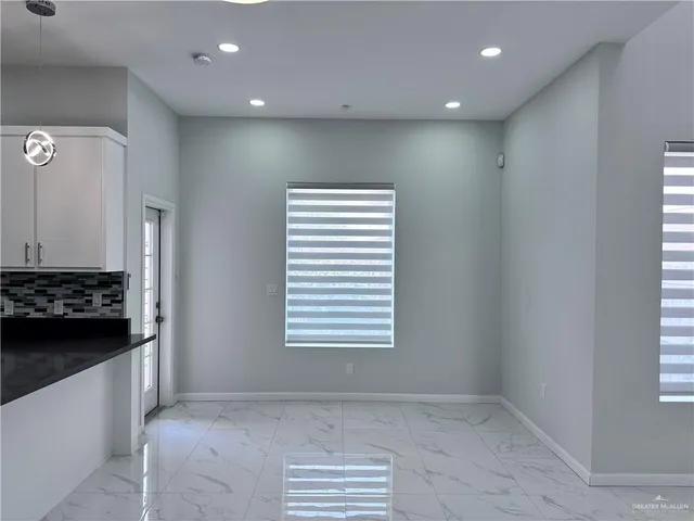 a view of kitchen and utility room