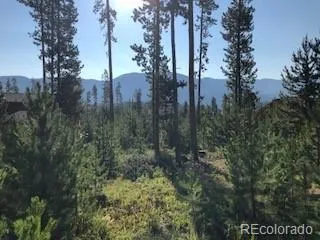 a view of a city with tall buildings