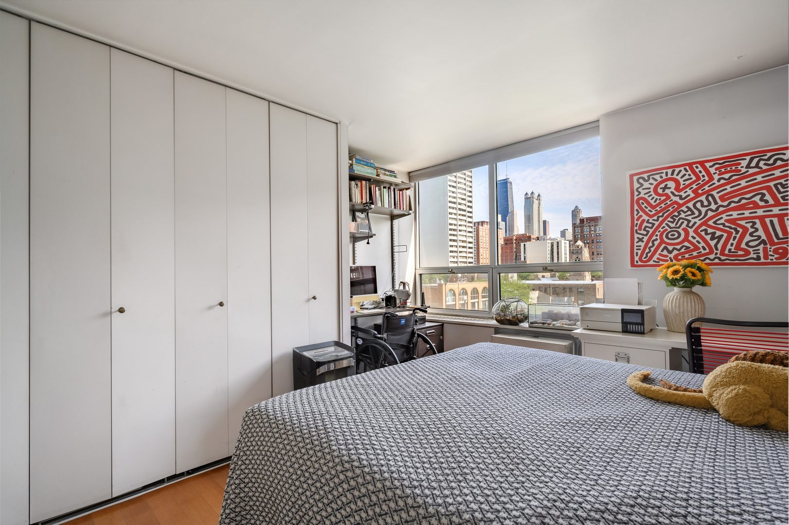 70 West Burton Place, Unit 705 Chicago, IL 60610 - Photo 13 of 17 a bedroom with furniture and a window