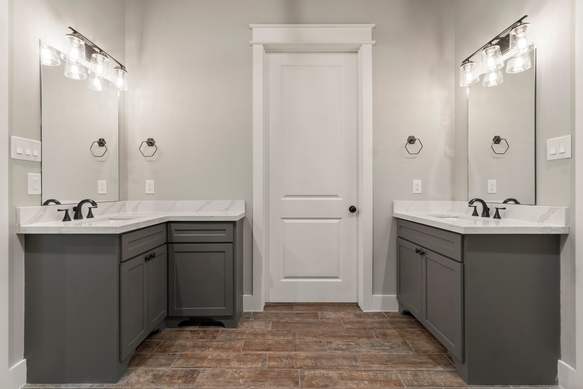 2402 Chantilly Lane Conroe, TX 77384 - Photo 21 of 49 a bathroom with a sink double vanity and a mirror