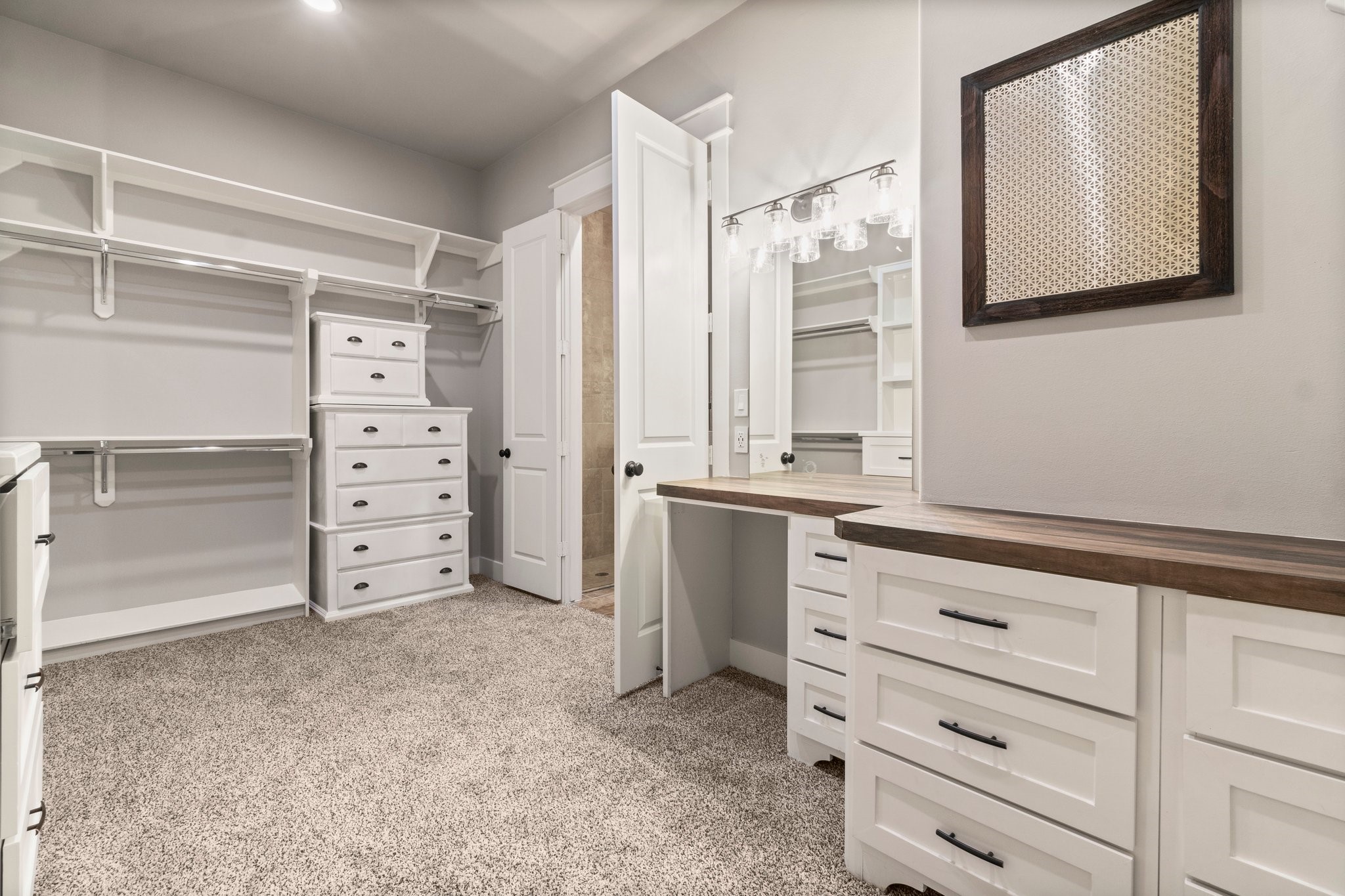 2402 Chantilly Lane Conroe, TX 77384 - Photo 22 of 49 a view of cabinets and dresser