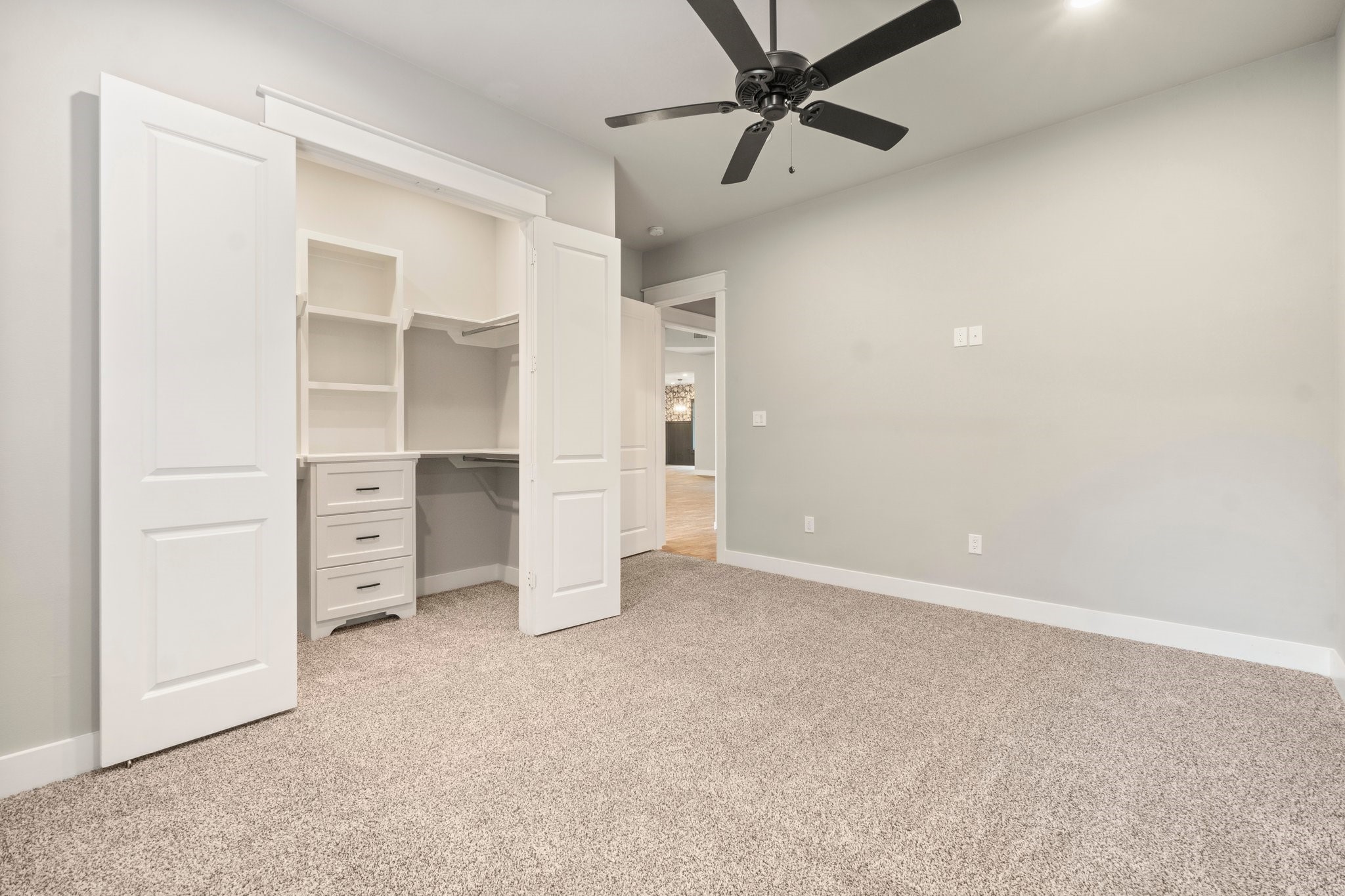 2402 Chantilly Lane Conroe, TX 77384 - Photo 24 of 49 an empty room with closet and windows