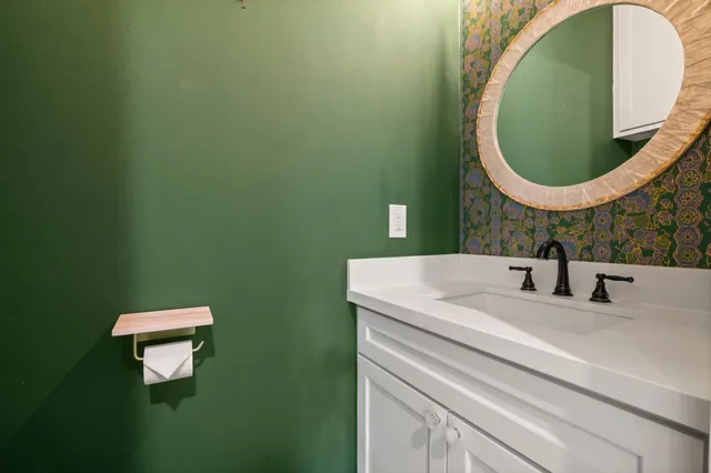 a view of staircase with white walls