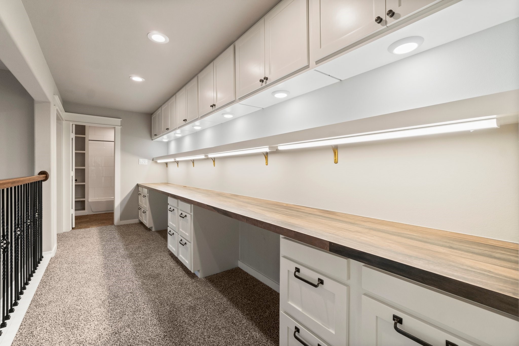 2402 Chantilly Lane Conroe, TX 77384 - Photo 41 of 49 a kitchen with a sink and cabinets