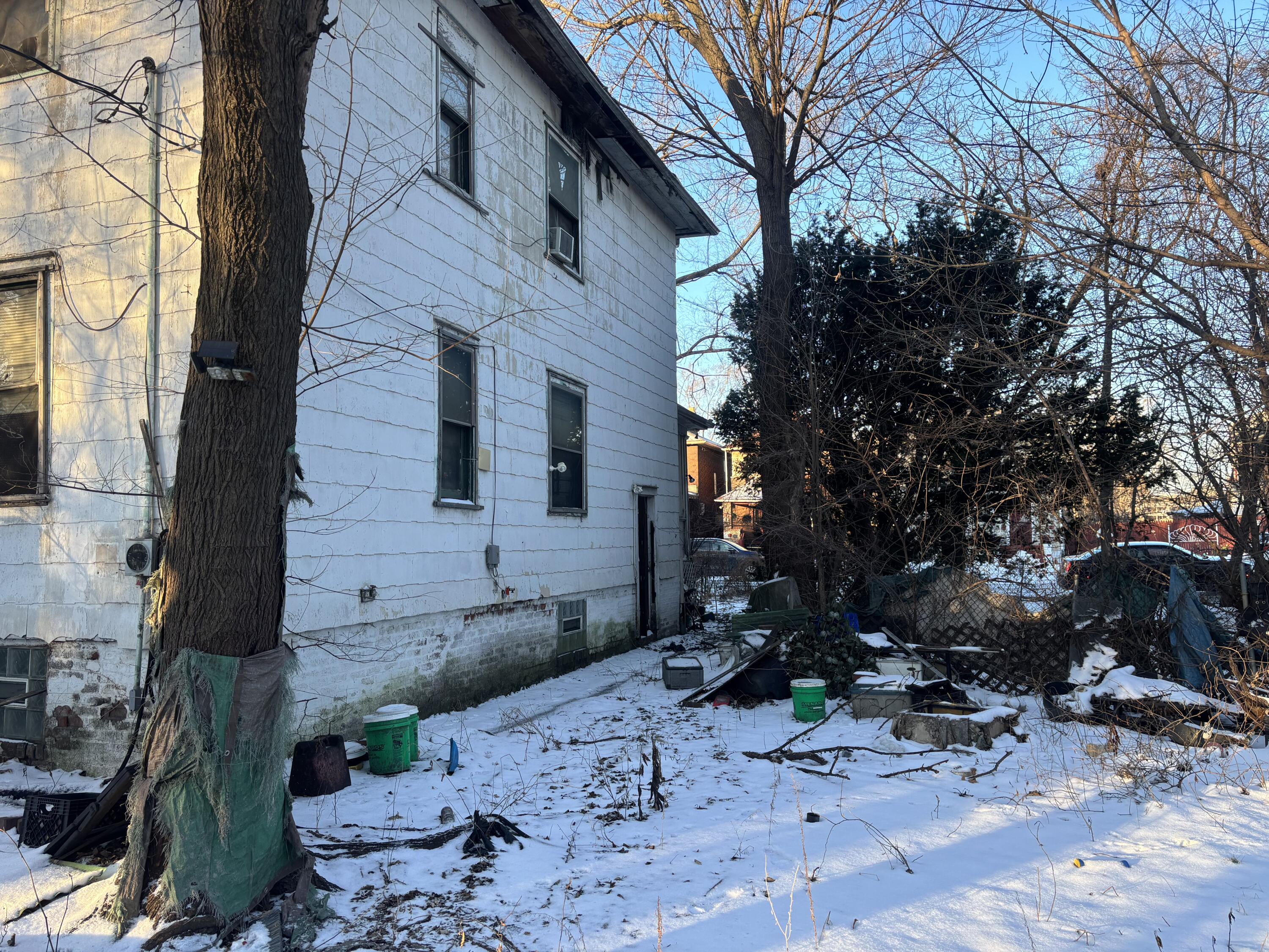 563 Pennsylvania Street Gary, IN 46402 - Photo 4 of 5 a backyard of a house with outdoor seating