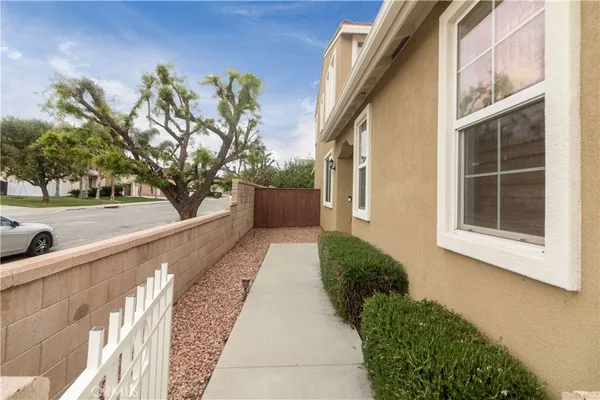 a view of a pathway with a yard
