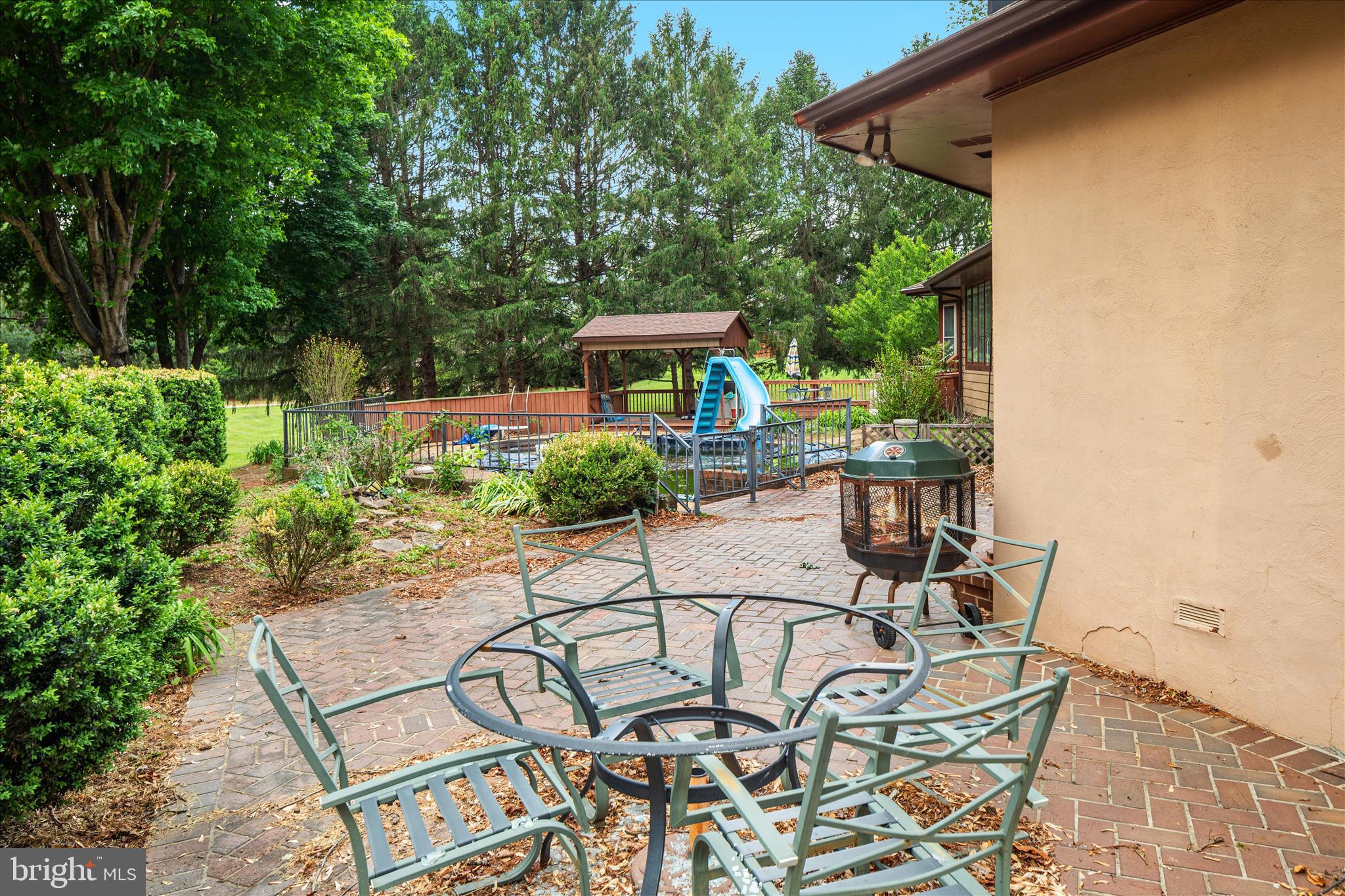 263 Bowling Green Road Front Royal, VA 22630 - Photo 48 of 75 a view of a patio with table and chairs and potted plants