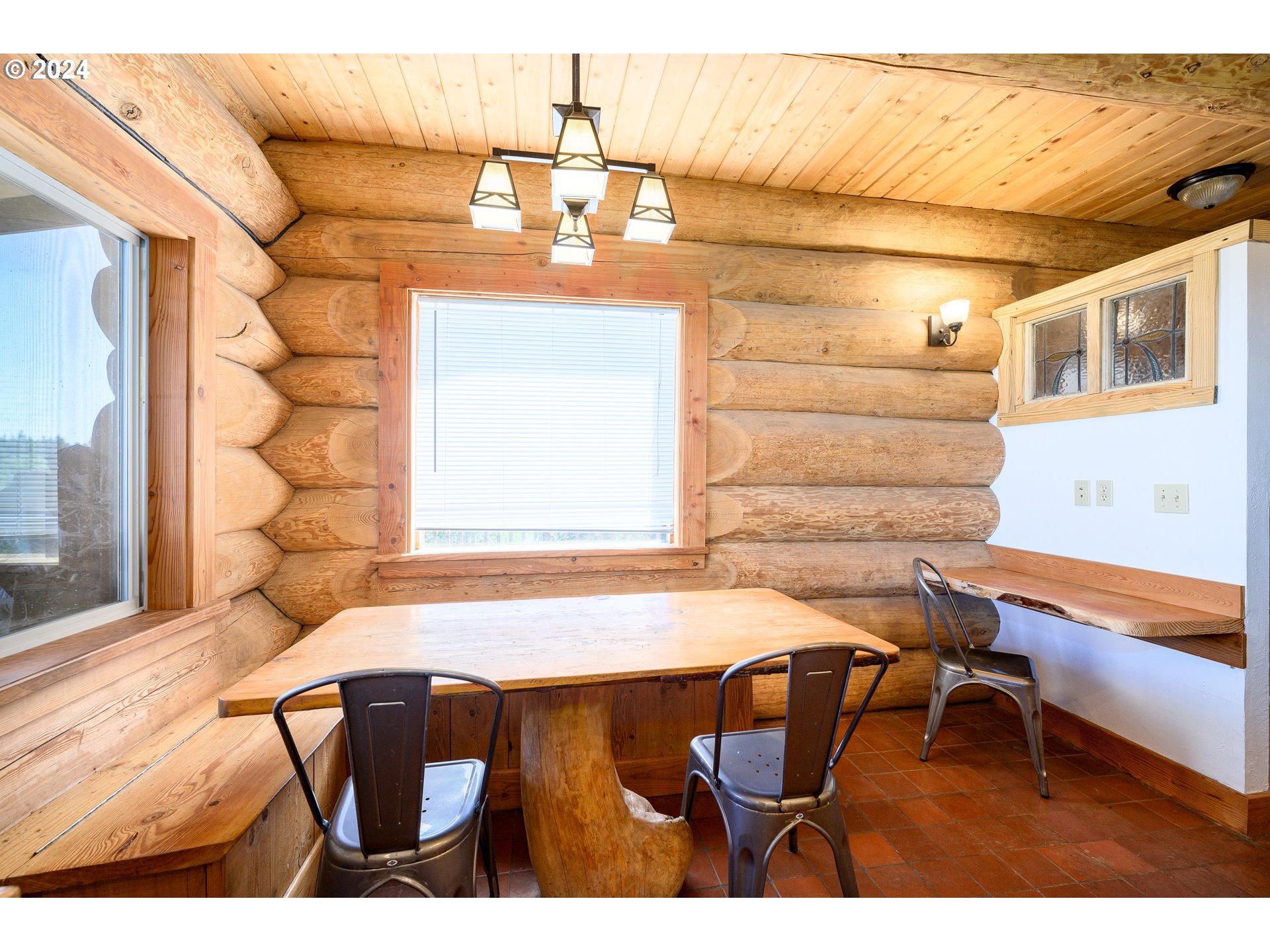 16300 Southeast Walnut Hill Road Amity, OR 97101 - Photo 11 of 48 a view of a dining room with furniture and wooden floor