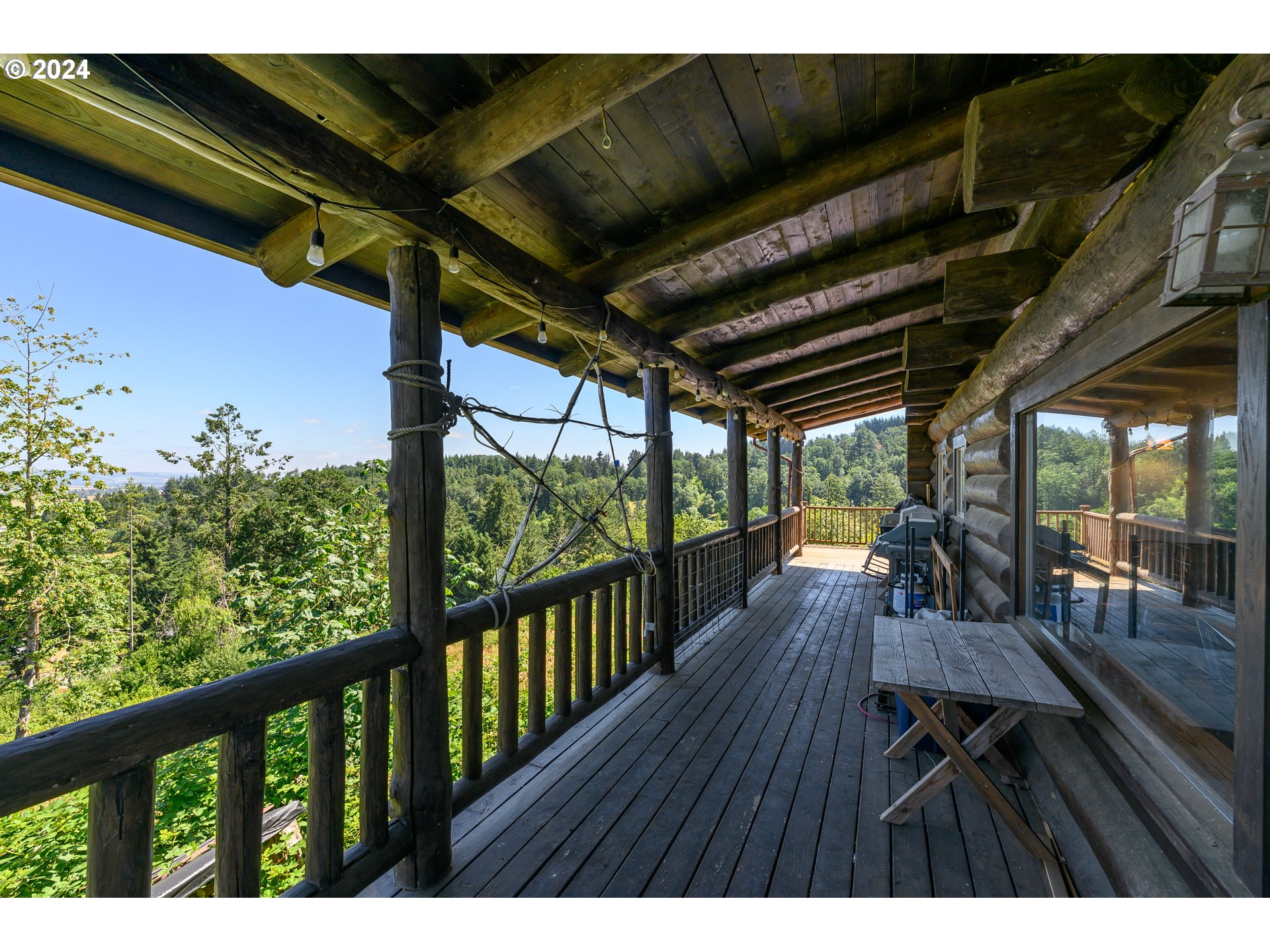 16300 Southeast Walnut Hill Road Amity, OR 97101 - Photo 7 of 48 a view of balcony with wooden floor