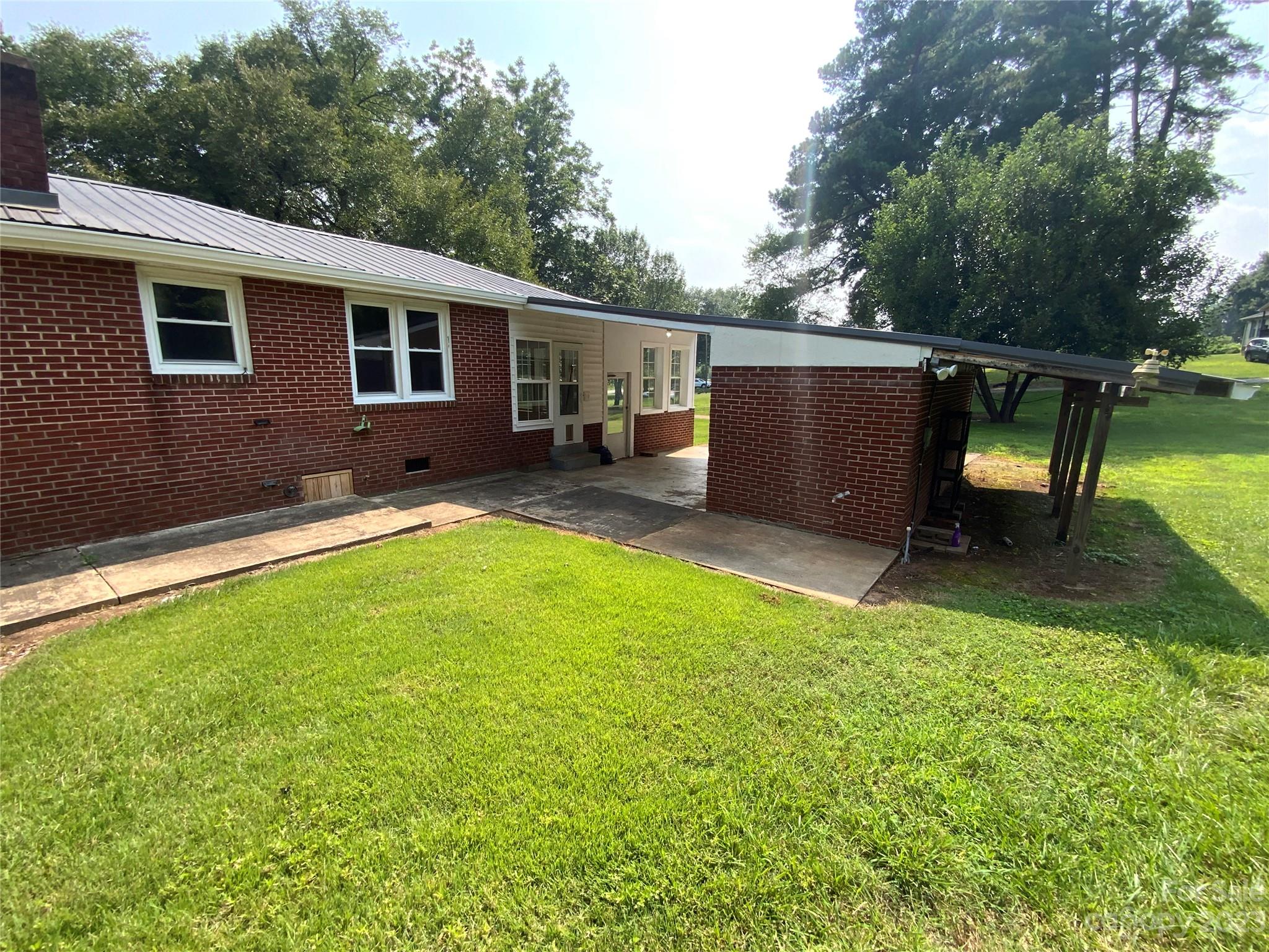 214 Bostic Yard Road Bostic, NC 28018 - Photo 28 of 31 a backyard of a house with seating space