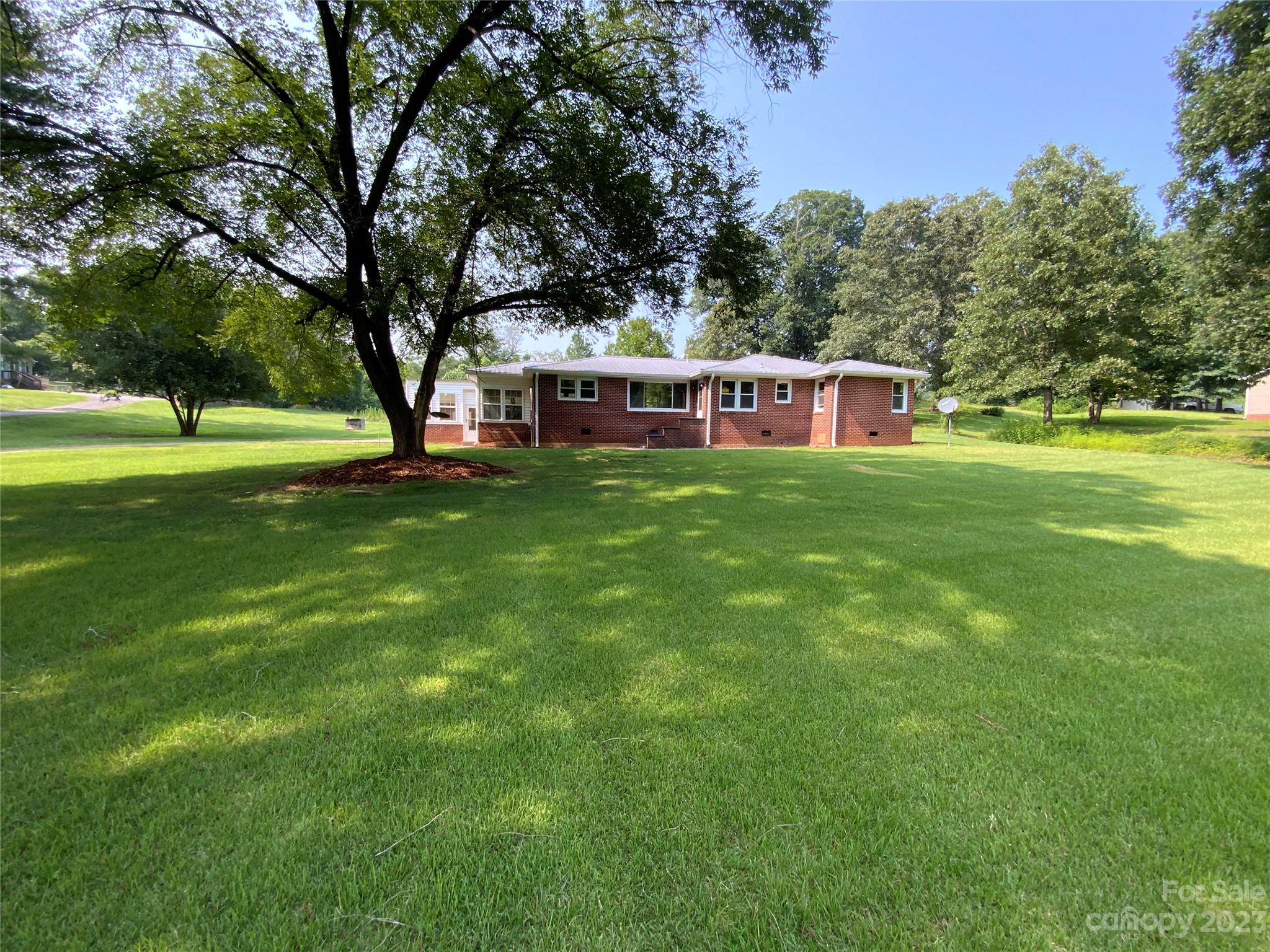 214 Bostic Yard Road Bostic, NC 28018 - Photo 3 of 31 a house view with a garden space