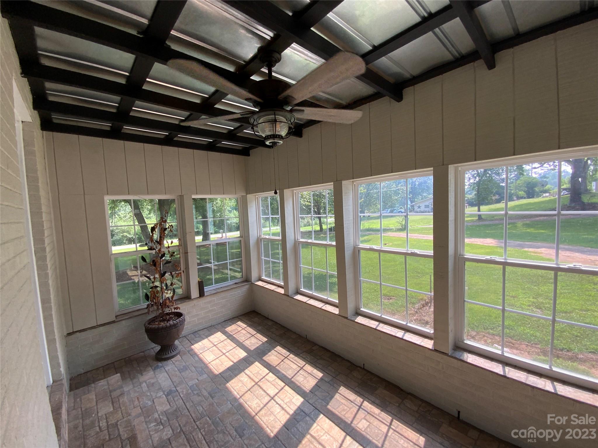 214 Bostic Yard Road Bostic, NC 28018 - Photo 5 of 31 a view of a room with large windows