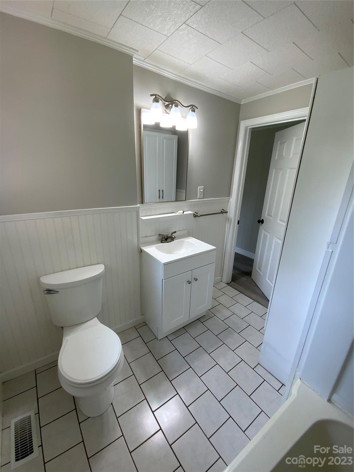 214 Bostic Yard Road Bostic, NC 28018 - Photo 10 of 31 a bathroom with a sink toilet and a mirror