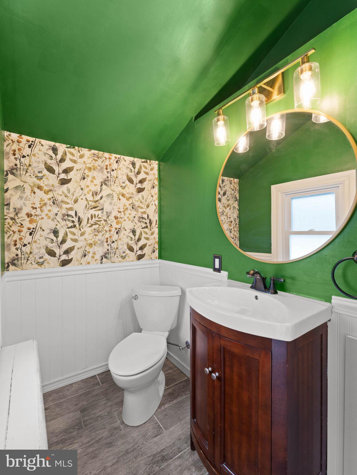400 2nd Street Swedesboro, NJ 08085 - Photo 13 of 33 a bathroom with a toilet sink and mirror