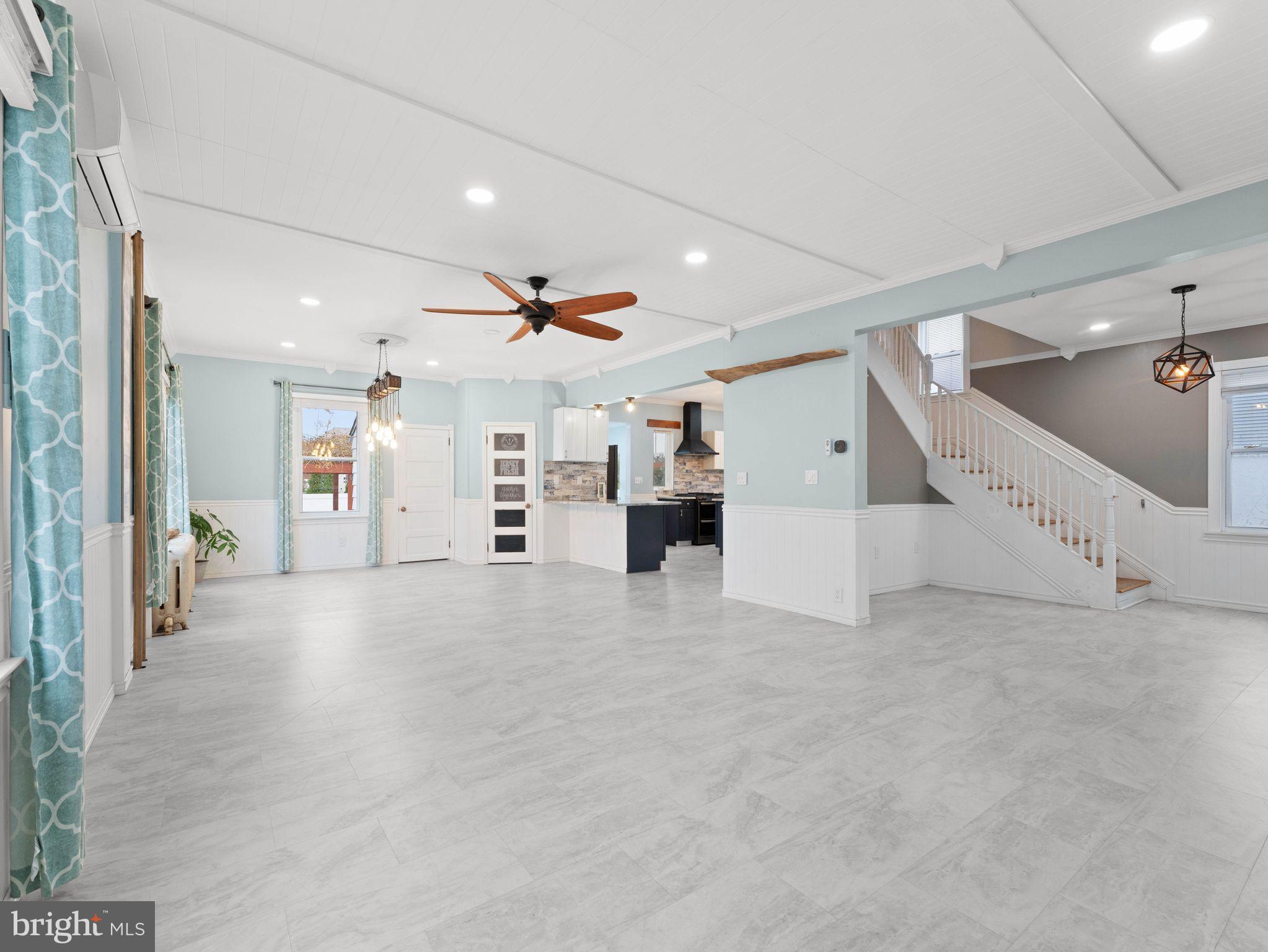 400 2nd Street Swedesboro, NJ 08085 - Photo 6 of 33 a view of a livingroom with furniture and a ceiling fan