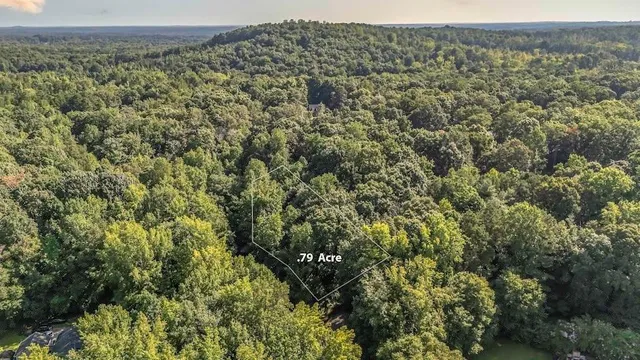 an aerial view of residential house with outdoor space
