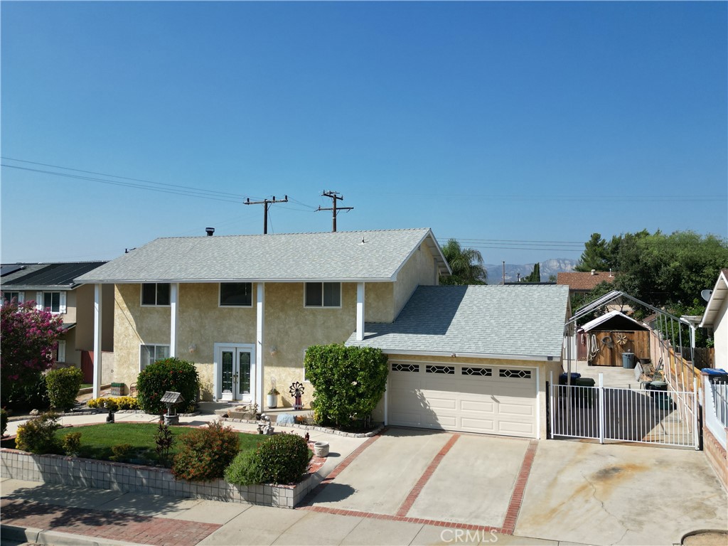 2993 Fitzgerald Road Simi Valley, CA 93065 - Photo 1 of 1 a front view of a house with garden