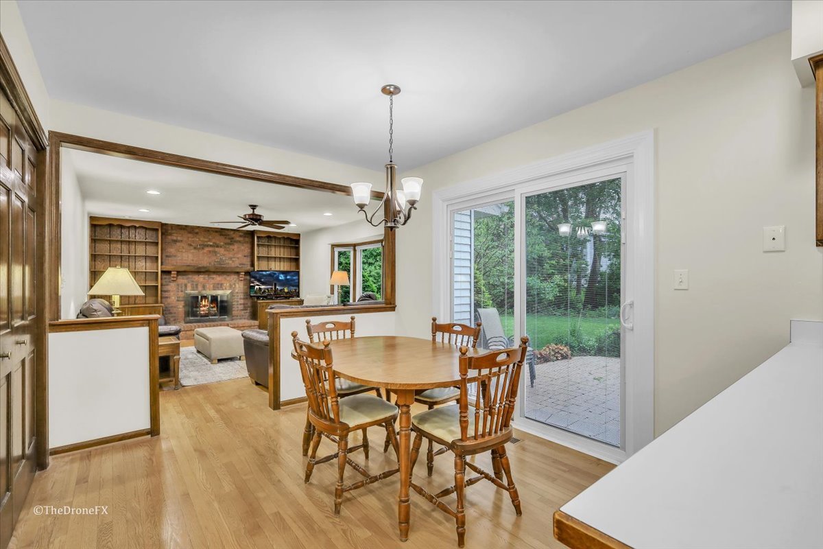 659 Brighton Drive Wheaton, IL 60189 - Photo 12 of 25 a view of a dining room with furniture window and outside view