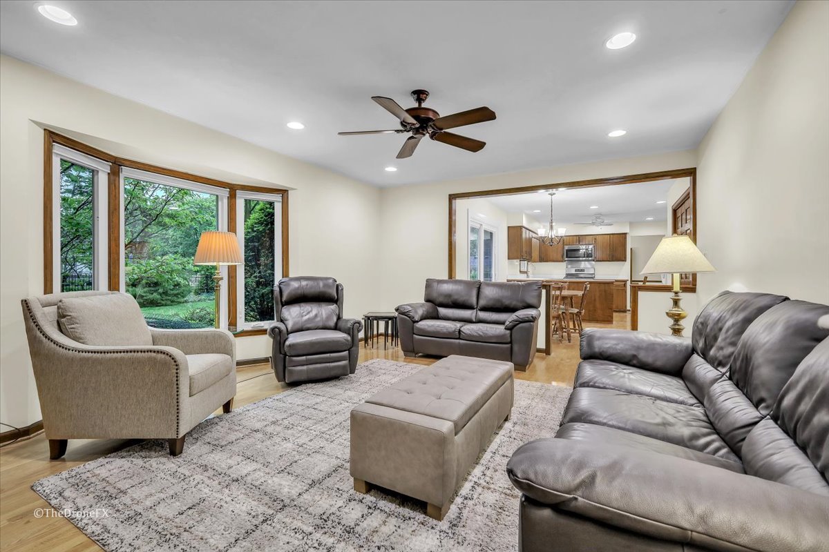 659 Brighton Drive Wheaton, IL 60189 - Photo 15 of 25 a living room with furniture and a large window