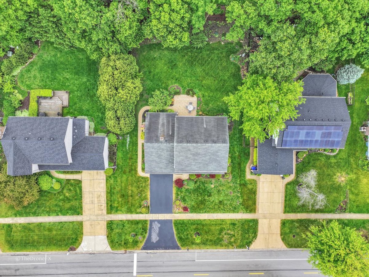659 Brighton Drive Wheaton, IL 60189 - Photo 4 of 25 an aerial view of a house with garden