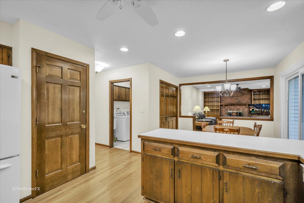 659 Brighton Drive Wheaton, IL 60189 - Photo 9 of 25 a kitchen with stainless steel appliances granite countertop a refrigerator and a sink