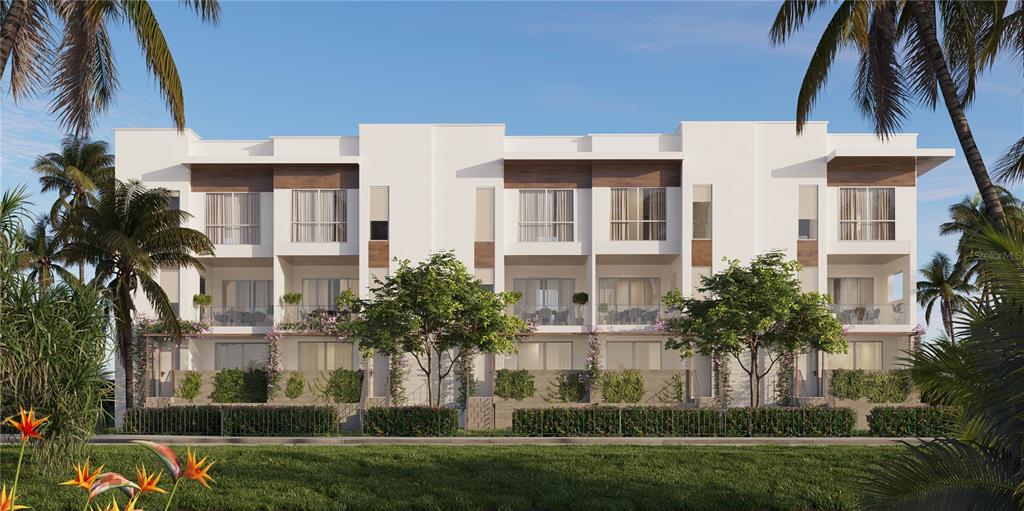 1028 Sunset Point Road, Unit R6 Clearwater, FL 33755 - Photo 2 of 27 a view of a white building among the yard