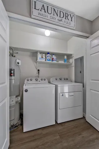 a utility room with washer and dryer