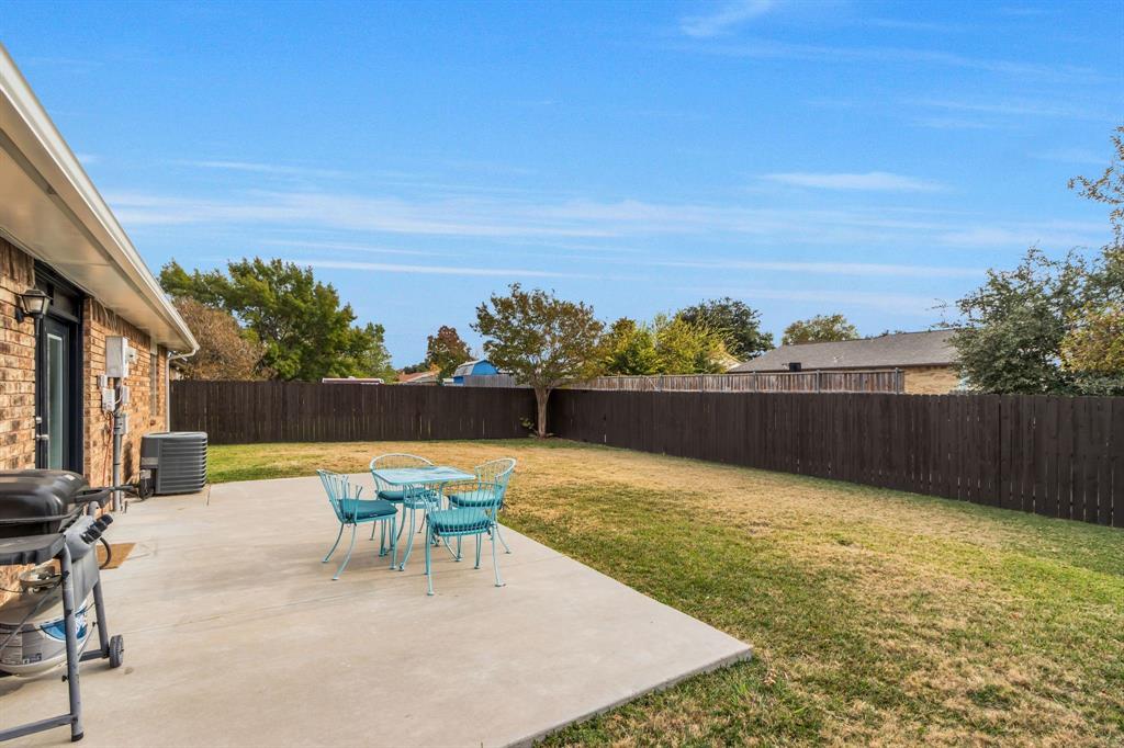 5652 Phelps Street The Colony, TX 75056 - Photo 29 of 29 a view of a swimming pool with a lounge chair